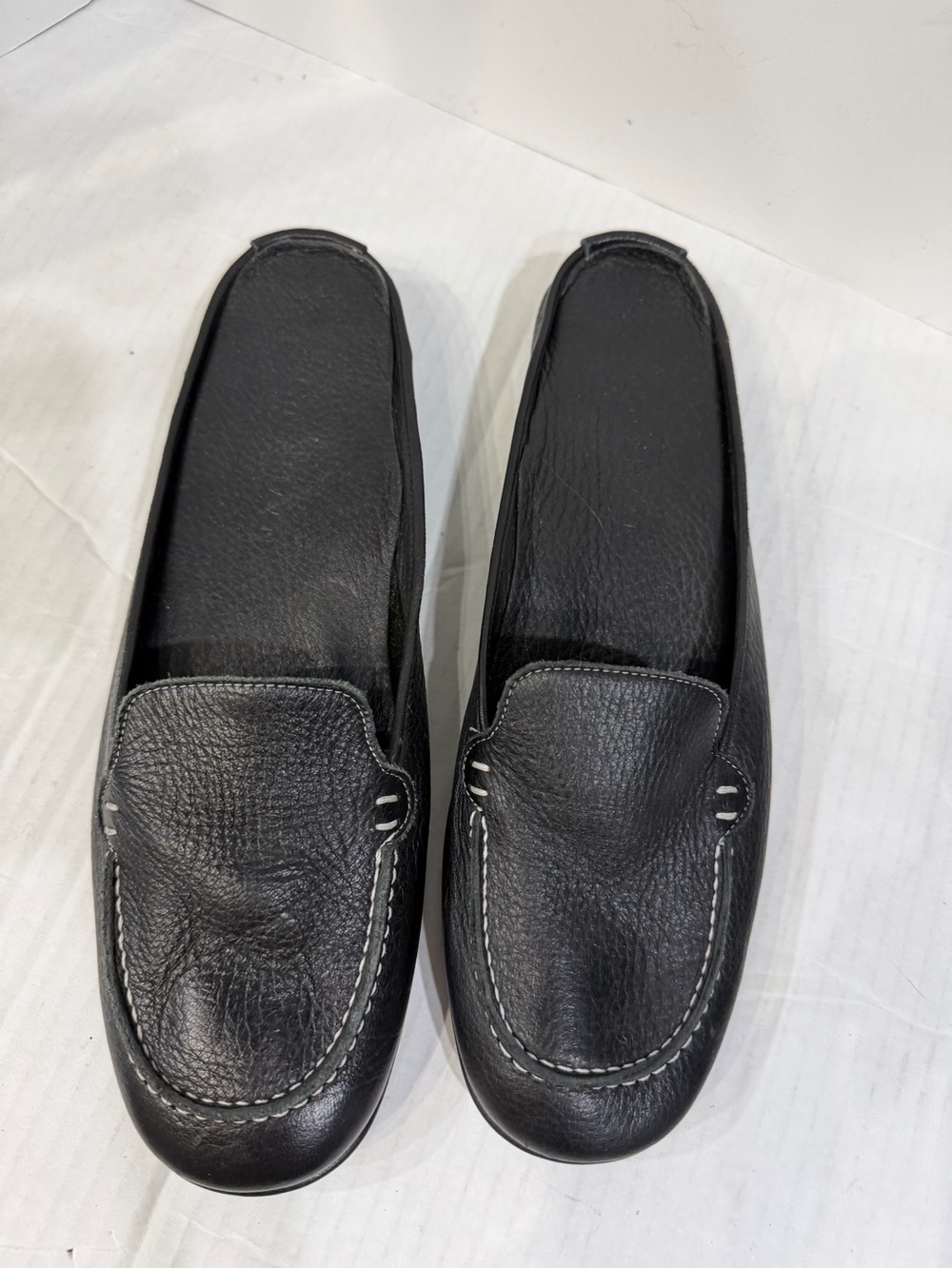 Cole Haan women’s Black Leather Slip-On Mule Loafers.